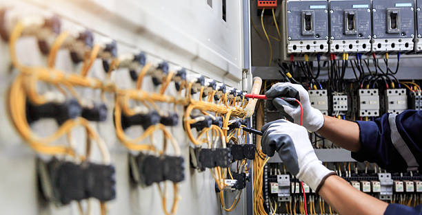 Professional Electrician technician working in Village St. George, LA